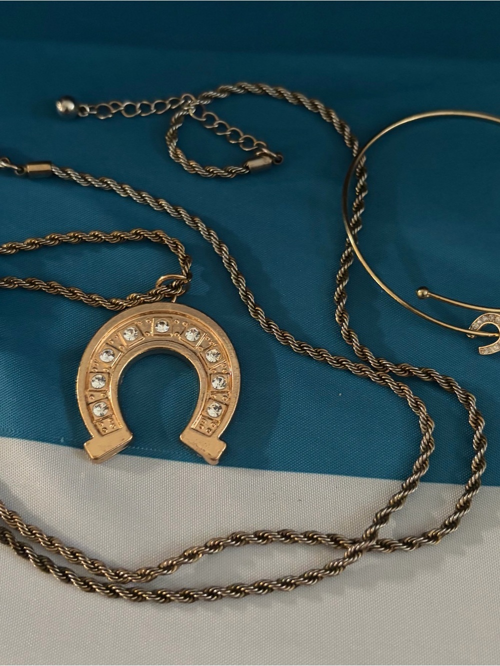 Gold-Tone Horseshoe Pendant Necklace with Crystal Accents with matching bracelet